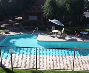 Pool and fence at Acacia Hills Apartments in Tucson Arizona July 2020